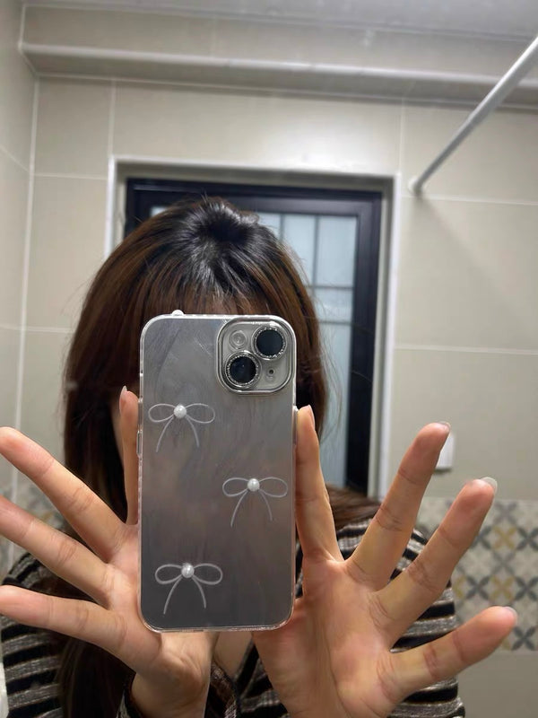 Review 1 photo for SILER TRIPLE BOW PEARL IPHONE CASE  WITH CHARM S0340